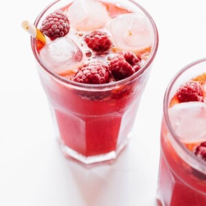 Trilogy copycat raspberry lemon kombucha in glasses on white background