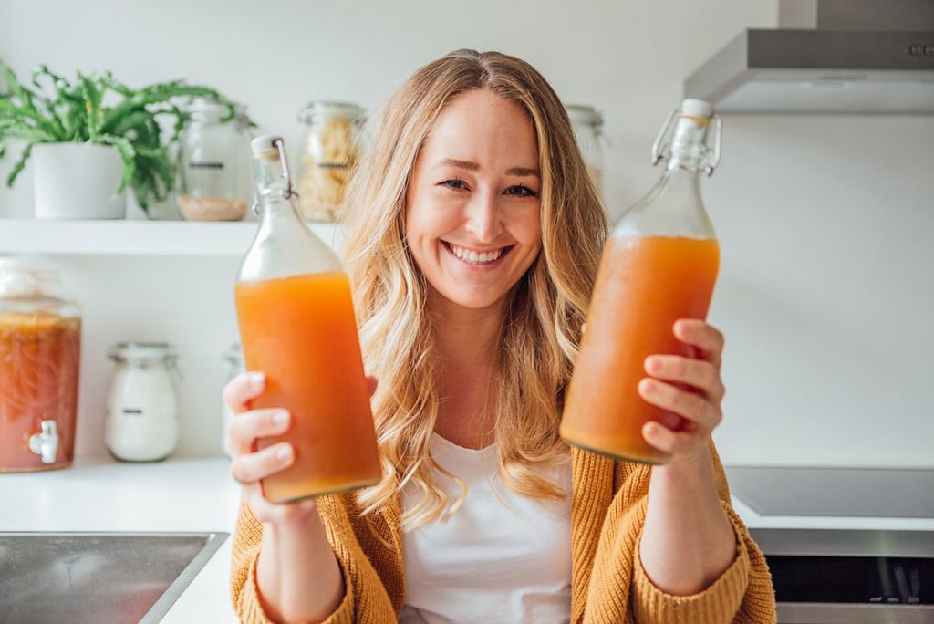 Sarah Bond with bottles of kombucha