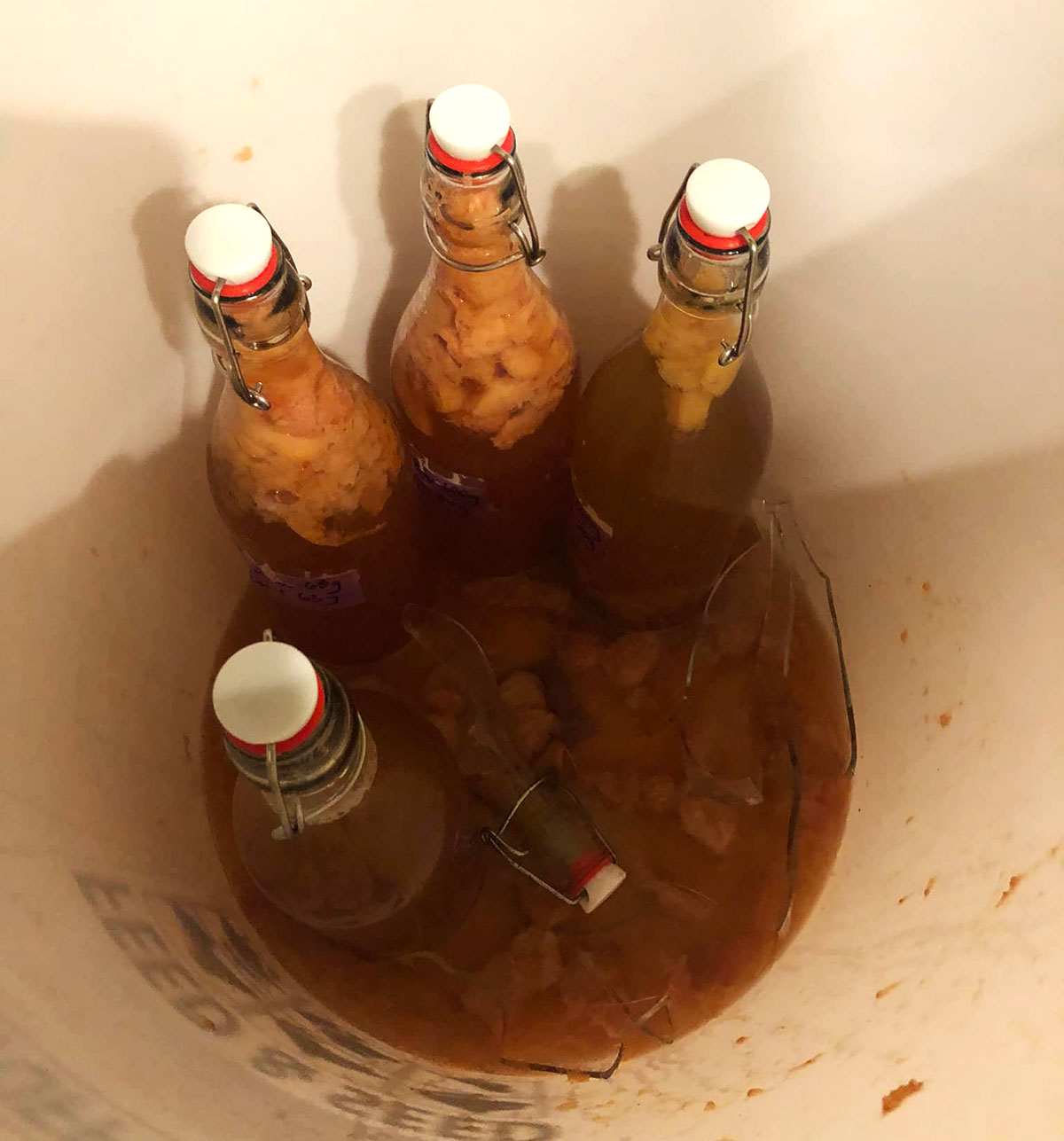 Exploded kombucha bottles.