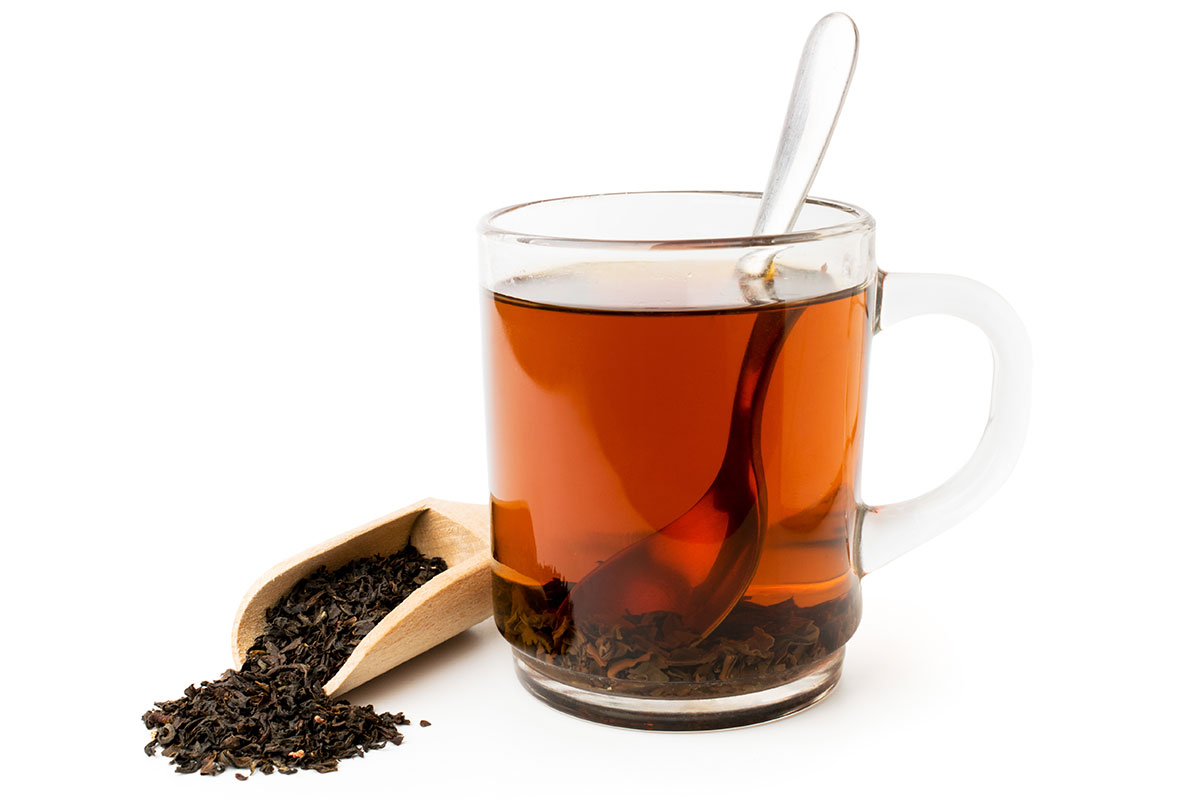 Black tea on white background.