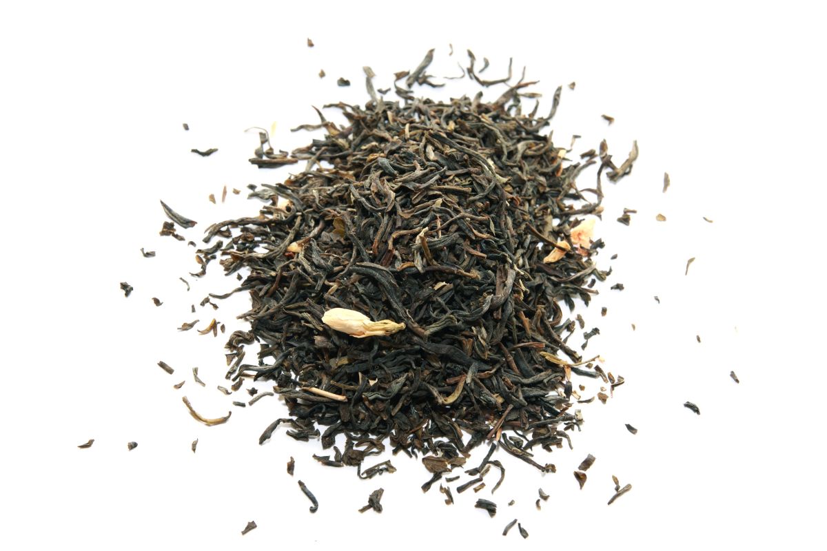 Jasmine tea leaves on an isolated white background.