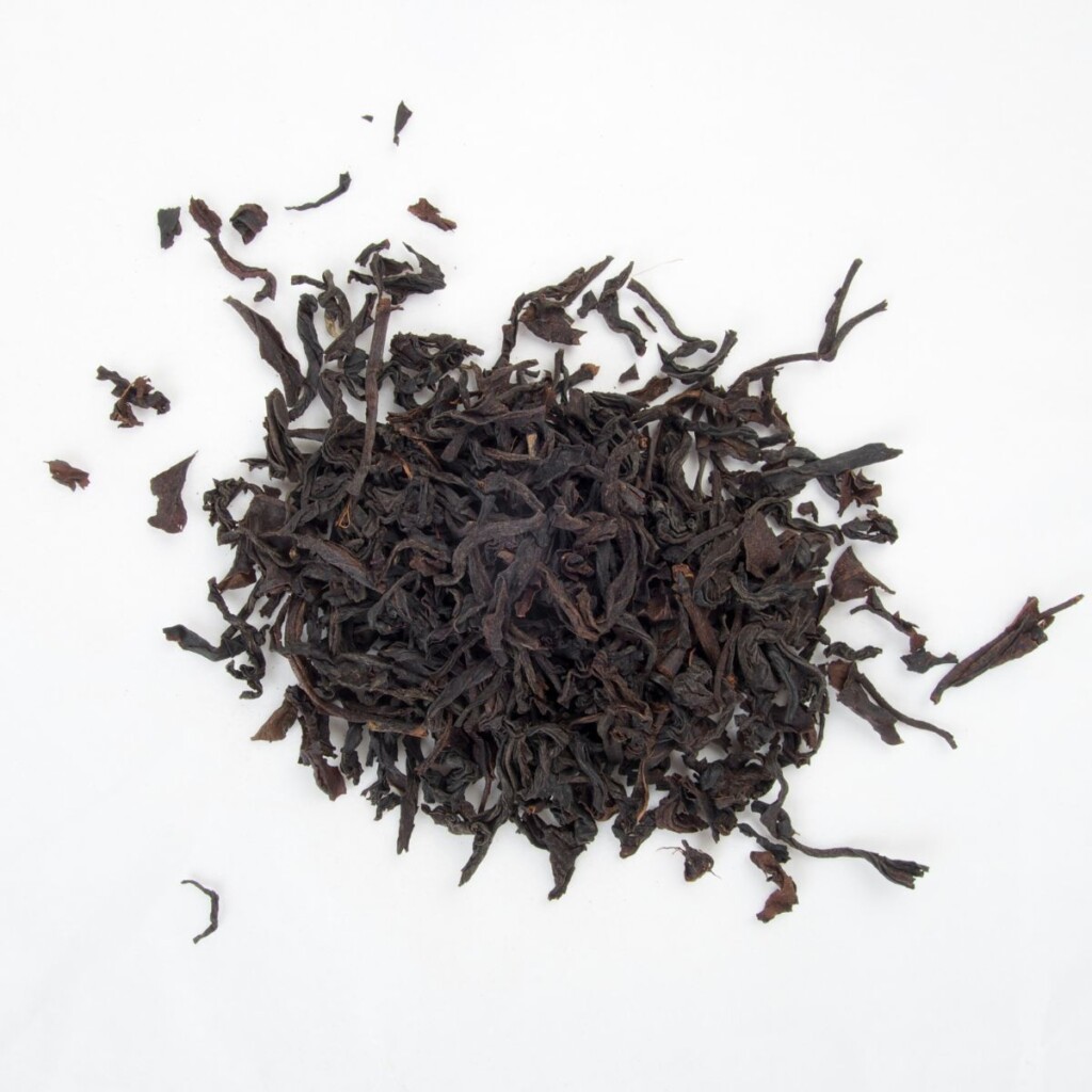 Nilgiri tea leaves on an isolated white background.
