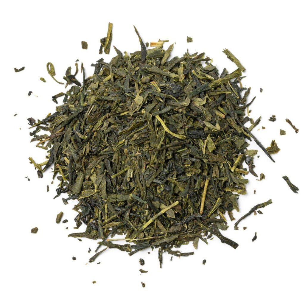 Sencha tea leaves on an isolated white background.
