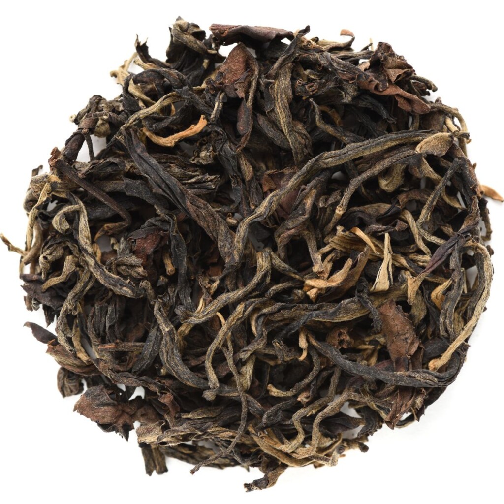 Yunnan tea leaves on an isolated white background.